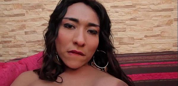  Transsexual beauty plays with her sexy body